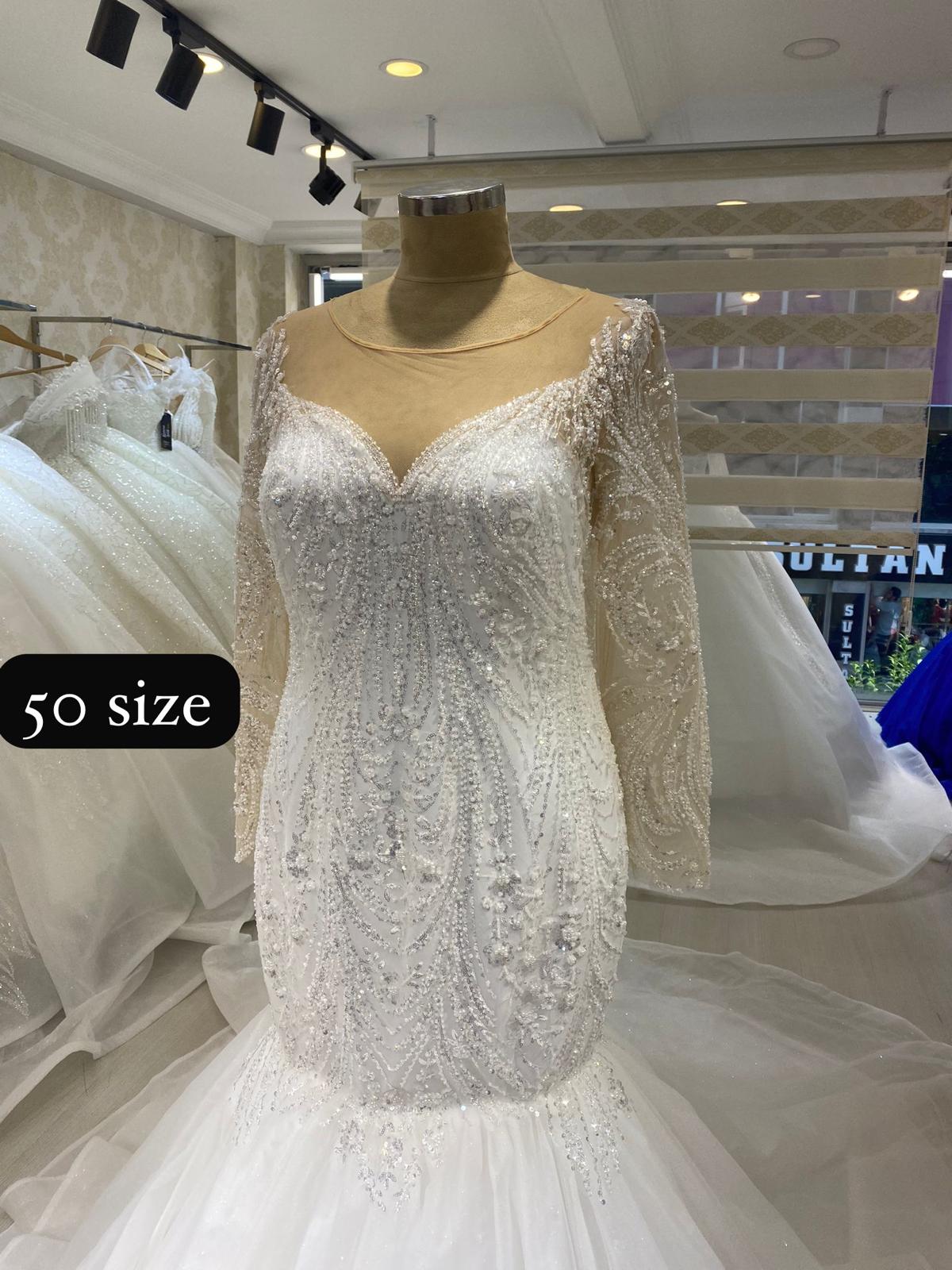 long-sleeve mermaid gown