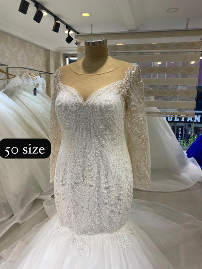 long-sleeve mermaid gown